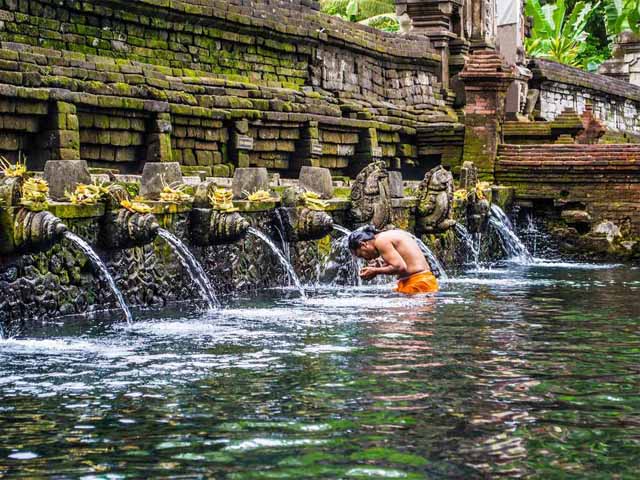 Cleansing negative elements at Tirta Empul Temple